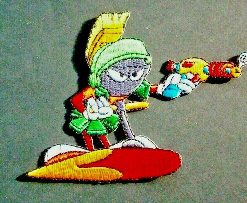3" tall, Marvin The Martian on a Space Sled embroidered patch. Sew on or iron on. New.

Please note we will always combine shipping on like items.  Any additional patch or pin will ship for 50 cent per item.  Any additional payment will be reimbursed to your Paypal account.  Thank You.