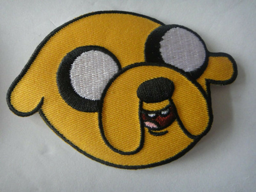 3.5  inches wide, a new Adventure TIme "Jake" embroidered patch.  Founding member of the Fantastic Four franchise.  Sew or iron on. New. 

Please note we will always combine shipping on like items.  Any additional patch or pin will ship for 50 cent per item.  Any additional payment will be reimbursed to your Paypal account.  Thank You.