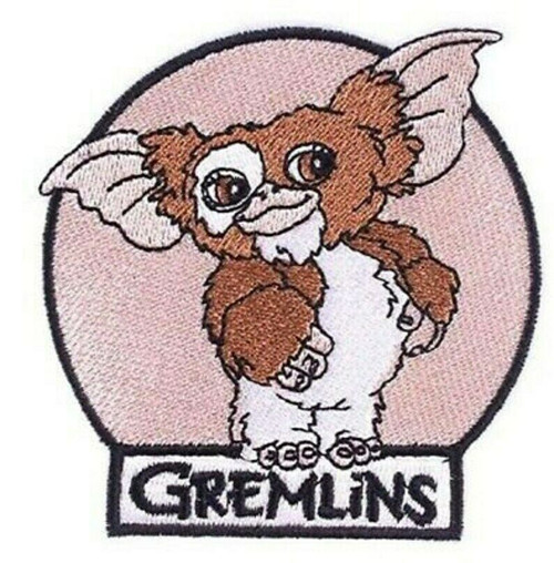 3 1/4 inches wide, a new Gremlins "Gizmo" embroidered  patch. Sew or iron on. New.

Please note we will always combine shipping on like items.  Any additional patch or pin will ship for 50 cent per item.  Any additional payment will be reimbursed to your Paypal account.  Thank You.