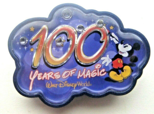 2. 5/8 inches wide, Disney 100 Years of Magic "Light-up" pin with clutch back. 2001.  
The batteries are not tested and you should change them when you buy the pin. 

Please note we will always combine shipping on like items.  Any additional patch or pin will ship for 50 cent per item.  Any additional payment will be reimbursed to your Paypal account.  Thank You.