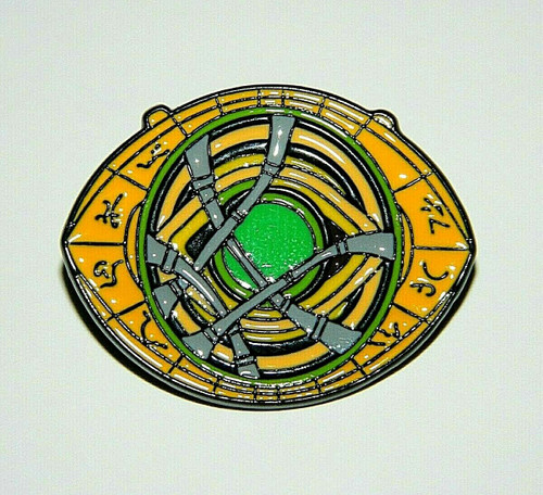 1. 3/8 inches wide, a new Doctor Strange Eye of Agamotto Logo Enamel pin with clutch and post for easy application. 

Please note we will always combine shipping on like items.  Any additional patch or pin will ship for 50 cent per item.  Any additional payment will be reimbursed to your Paypal account.  Thank You.