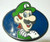 New metal "Nintendo" Mario Bros. "Luigi" Enamel Belt Buckle     The features are raised to show off the detail with the different enamel colors.   The belt buckle measures 3.75 inches wide by 3.25 inches tall.  The buckle will accommodate aa belt strap upto to 1.5 inches wide.   A web belt or any belt strap is not included,  only the buckle described. 

Please note we will always combine shipping on like items.  Any additional patch or pin will ship for 50 cent per item.  Any additional payment will be reimbursed to your Paypal account.  Thank You.