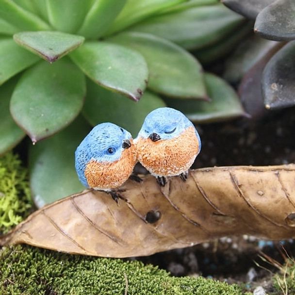 Bluebirds on Leaf