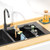XILIMEN Dish Cloth Holder for Kitchen Sink, Adjustable Over-The-Sink Dish Rag Rack, Metal Kitchen Racks Sink Brush Holder, Drying Rack for Dishcloths, Sponges, Brushes, and Bottles (1, Sliver)