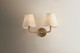 Olia Two Light Wall Sconce (H1171102-PBR)
