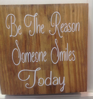 Be the reason someone smiles today sign