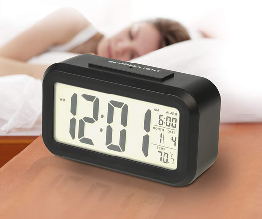 RCA Portable Alarm Clock with Auto Night Light Sensor, Temperature & Calendar