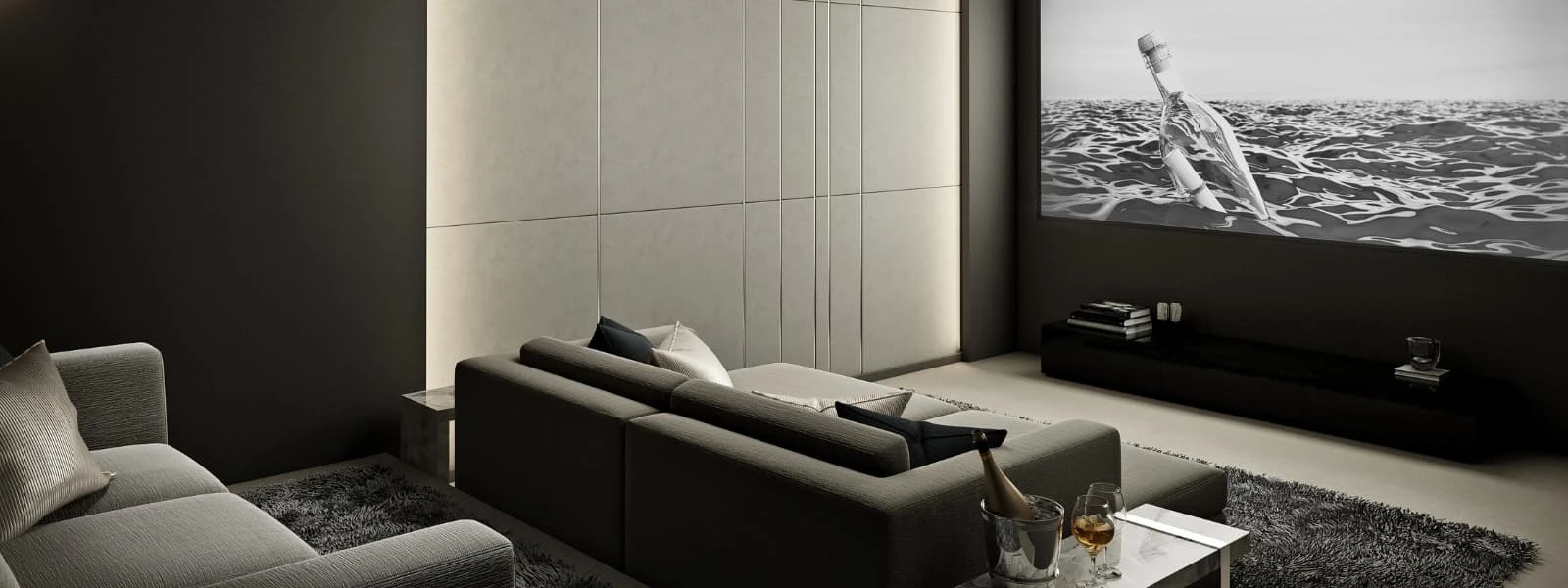 Dedicated home cinema room with a large screen and seating