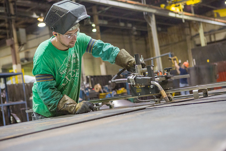 Person Welding E-Z Pack Goliath G400 Parts