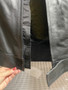 Front closure with velcro for style and convenience.