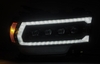 AlphaRex NOVA Series Alpha Black LED Projector Headlights 2019 to 2022 Ram 2500/3500 (For trucks with Factory Halogen Headlights) (ARX880552)-Light View 