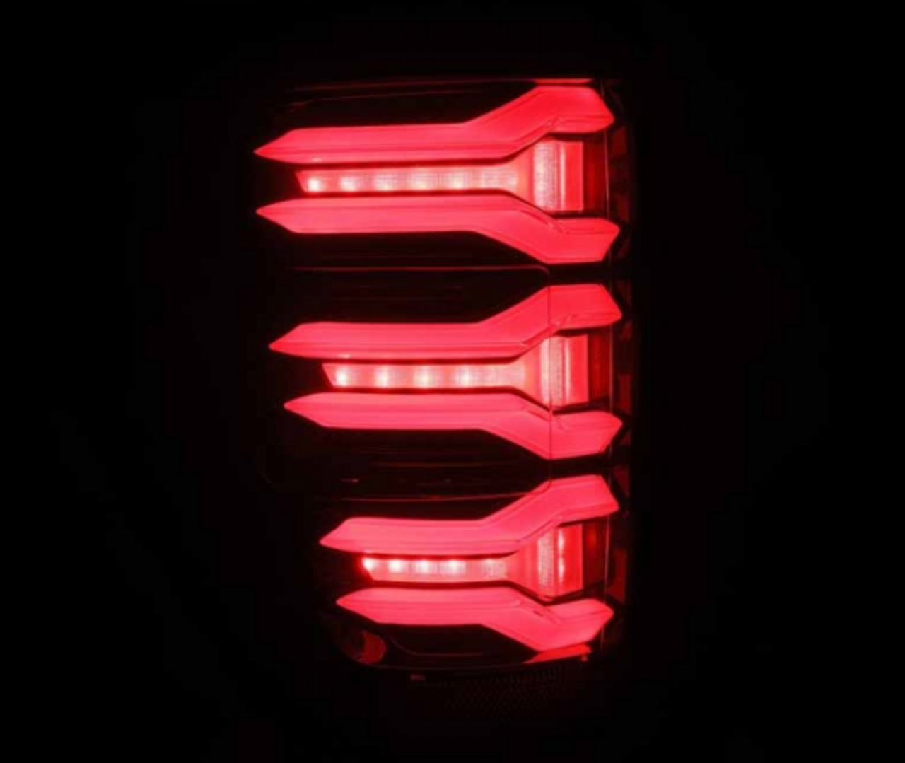 AlphaRex Luxx Series Black/Red LED Tail Lights 2021 to 2023 Ford F150 (Without Blind Spot Monitor) (653030)-Night View