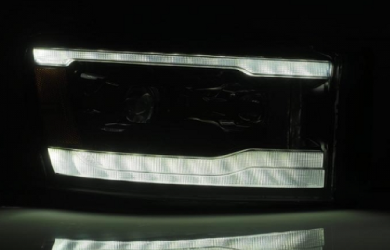 AlphaRex LUXX Series Alpha Black LED Projector Headlights 2006 to 2009 Ram 2500/3500 (ARX880533)-Night View