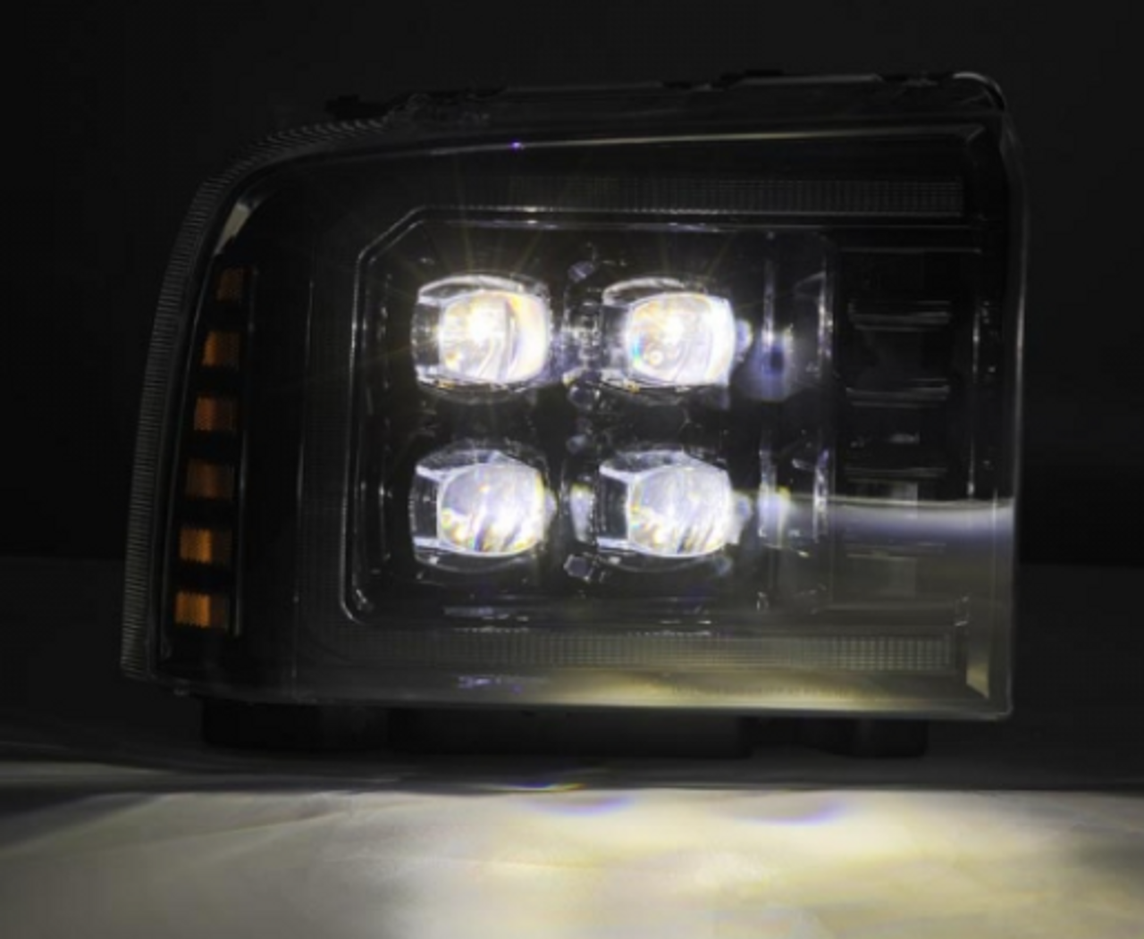 AlphaRex NOVA Series Alpha Black LED Projector Headlights 2005 to 2007 Ford F 250/350/450/550 (ARX880318)-Light View