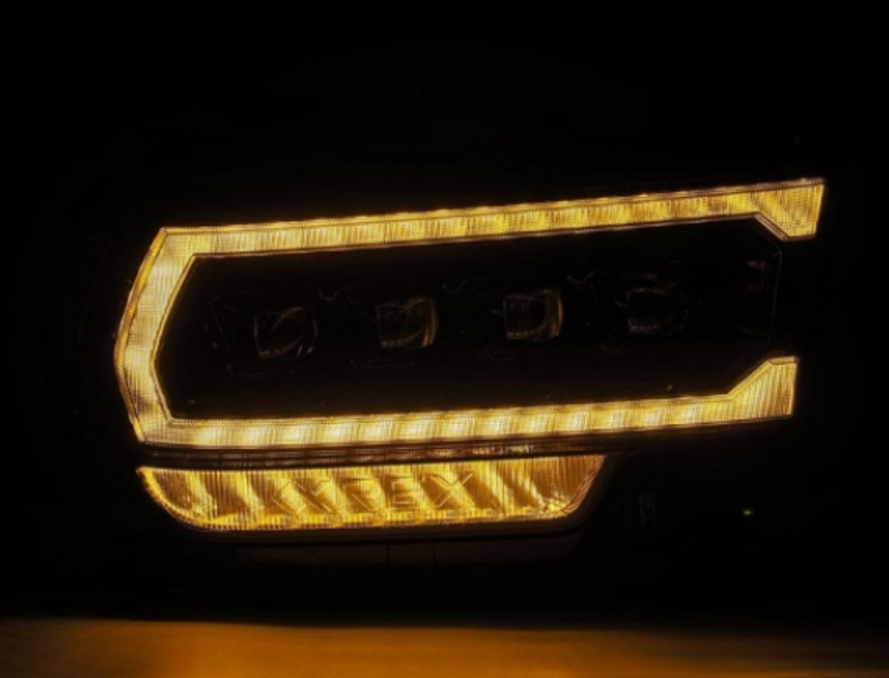 AlphaRex NOVA Series Alpha Black LED Projector Headlights 2019 to 2022 Ram 2500/3500 (For trucks with Factory Halogen Headlights) (ARX880552)-Light View 