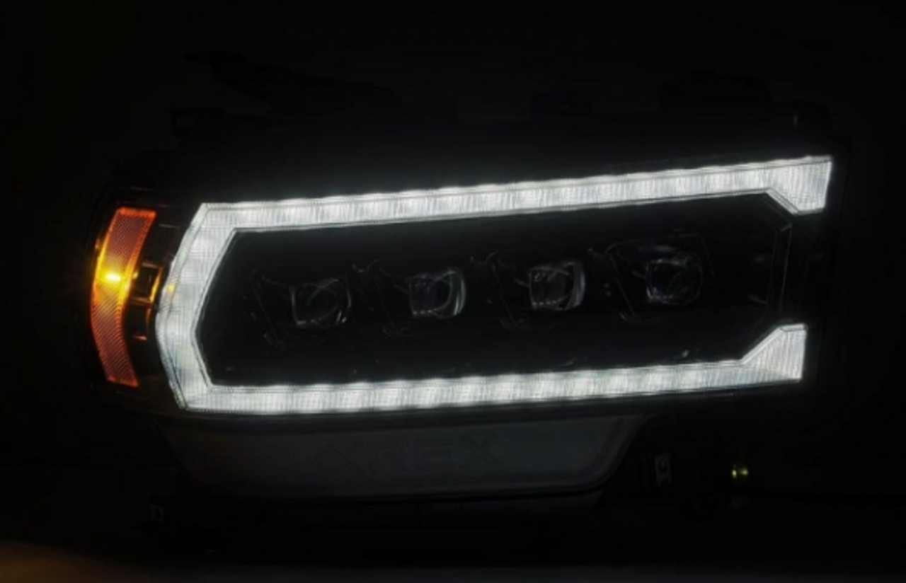 AlphaRex NOVA Series Alpha Black LED Projector Headlights 2019 to 2022 Ram 2500/3500 (For trucks with Factory Halogen Headlights) (ARX880552)-Light View 