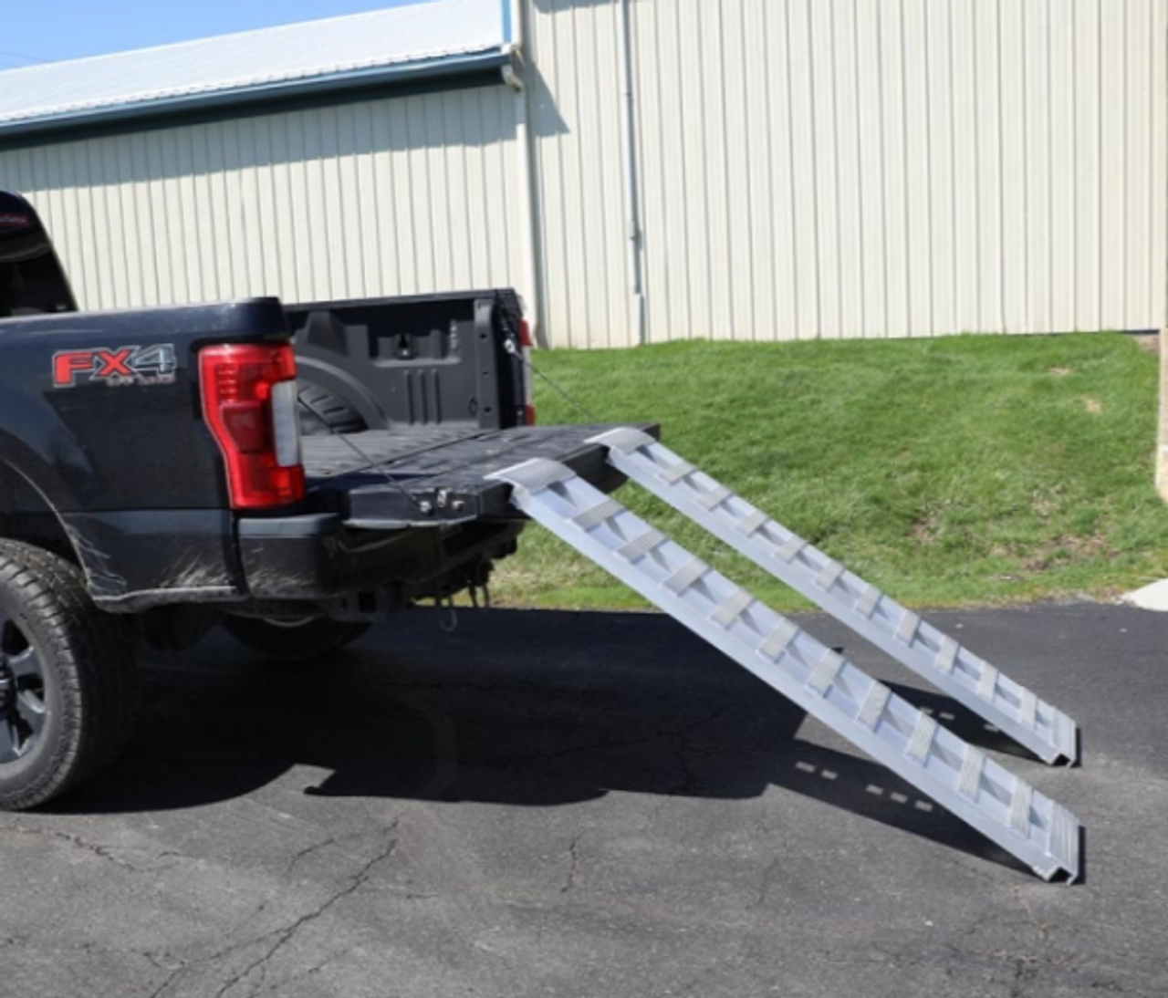 GEN-Y Hitch Heavy Duty 14' Aluminum Loading Ramps (Pair) Universal 15" x 168" (8,000 LB Capacity) (GH-16168)-In Use View