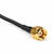 Close-up of the gold RP-SMA male connector with internal threads and center socket.