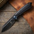 8" Black Stainless Steel Assisted Pocket Knife w/ Black Handle & Blue Accent