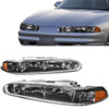 98-02 Oldsmobile Intrigue Headlights - Black Housing Amber Corner