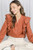Burnt Orange Lace Trim Ruffled Blouse