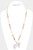 Ivory Floral Cow Necklace & Earrings Set