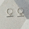 Small Sleeper earrings with T-Bar drop detail.