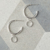 Hoop earring with stud fitting and beaded drop detail.