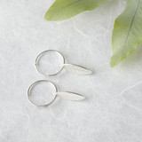 Comfortable silver sleeper earrings with hand engraved delicate leaf shaped drops.