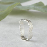 Overlapping wreath style ring.