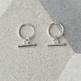 Small Sleeper earrings with T-Bar drop detail.