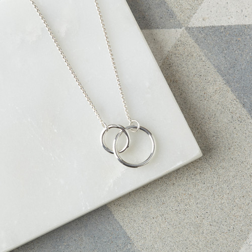 Unity necklace. Two interlinked circles.