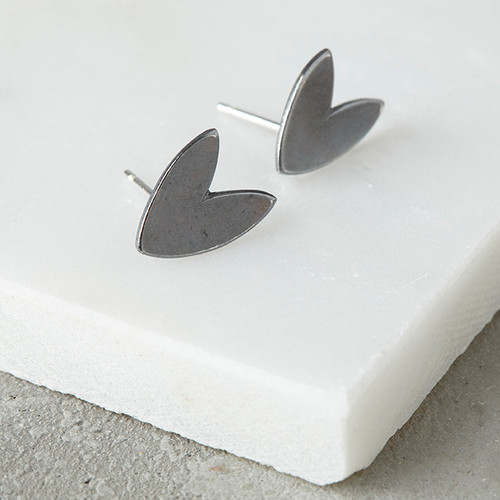 Petal stud earrings with blackened surface. Sterling silver oxidized.