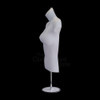White female mannequin torso side view with metal base on black background