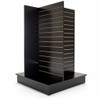 Black slatwall tower showing exposed brown groove channels for insert strips, four merchandising faces