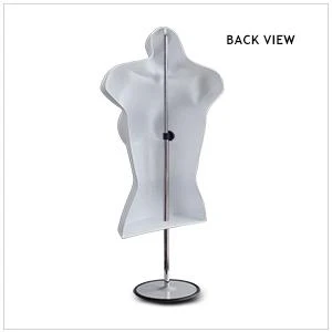 Hollow back of the white female torso mannequin, sits flush against walls