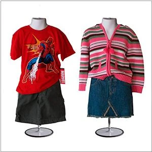 White child mannequin displaying boys and girls clothing