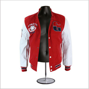 Letterman jacket displayed on the black torso mannequin