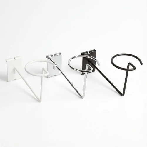 Three wire cap holders with looped cradles and gridwall back plates in white, chrome, and black finishes