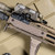 RailScales 3-Slot G10 XOS-W™ TerraCore® Honeycomb M-LOK Scale, 3-Slot G10 XOS-H® TerraCore® Honeycomb M-LOK Scale, QTR-LT™ Stop, Anchor® M-LOK VFG, 1.5-Slot HTP® Solo's™ Honeycomb FDE Scale | 11.5" URG-I CQBR Upper, Geissele 10.5" Mk16 DDC Rail, Daniel Defense 11.5" 5.56 Barrel, Surefire Scout Light Pro IR w/ M-LOK Mount, CSM-07 Pressure Switch, L3Harris NGAL, SOCOM556-RC2