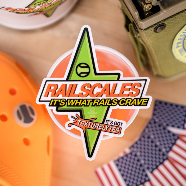 RailScales® Brawndo Premium PVC Matte Vinyl Sticker  | FN M249 SAW Post Sample MG, Stanley Stay Chill Pitcher, Crocs Classic Clogs in Orange Zing.