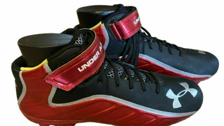 Red and black sales under armour baseball cleats