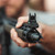 A Black MBUS 3 Sight - Front attached to a Rifle end. Product made by Magpul Industries.