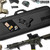 A closed Obsidian Black Specialist Single Rifle Case -36" with a rifle next to it. Product made by Savior Equipment.