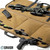 An opened Dark FDE Specialist Single Rifle Case - 42"with a rifle and other gear in pockets. Product made by Savior Equipment.