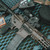 Lifestyle photo of the 11.5inch Criterion Core Pistol .223 Wylde Barrel, CRM HD M-LOK® MAS Grey on a table.