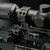 Lifestyle photo of the MK2 30MM Scope Mount attached to a rifle, zoomed in towards the scope. Product made by Midwest Industries.
