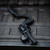 The Bounty Hunter Chiappa Rhino Small Frame Stock & Arm Brace on a revolver resting on a tailgate. Product made by Midwest Industries.