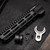 The AR15 Barrel Nut Wrench is on a table next to a handguard. Product made by Midwest Industries.