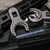 Two AR15 Barrel Nut Wrenches leaning against a handguard and screwed into a torque wrench, focusing on the left wrench. Product made by Midwest Industries.